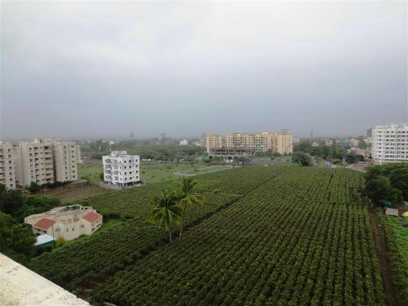 Housing and markets on 25 acres near Sanjay Lake